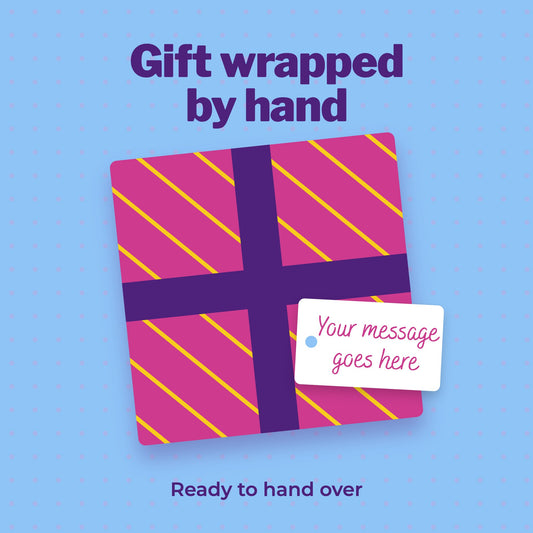 A present wrapped in pink striped paper with a purple ribbon and a gift tag